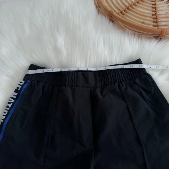 P.E Nation Torque Track Pants Snap Button Black Blue Stripe - Picture 15 of 16